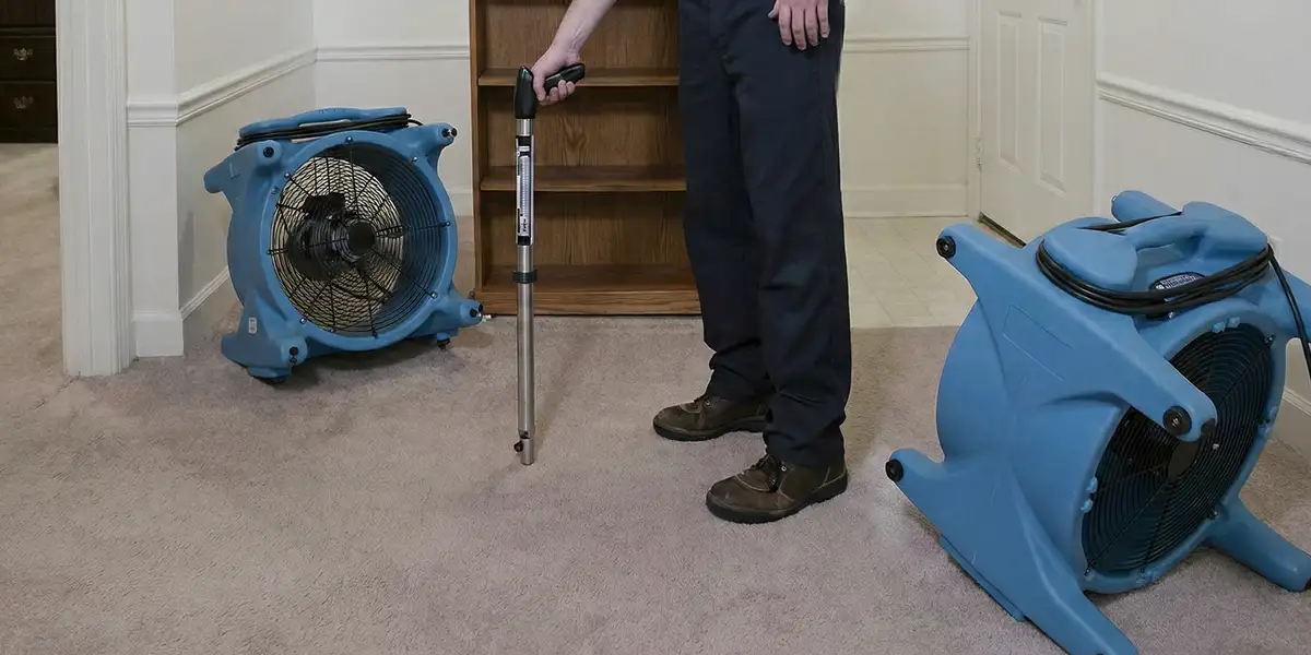 emergency water removal equipment deployed to dry a flooded residential interior in Grand Rapids, MI